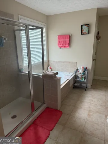 a room with a bed and a table