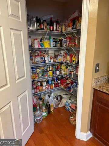 a room with storage and utility