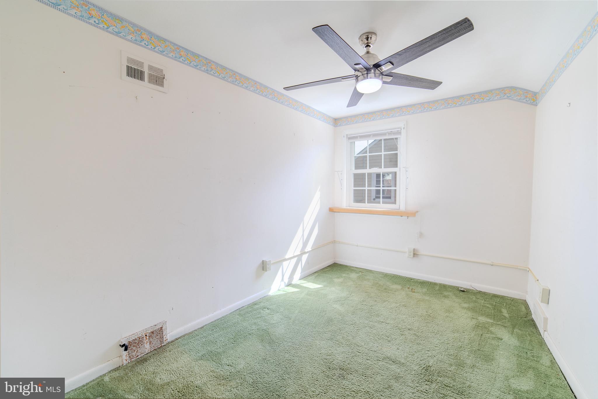 304 Earlington Road Havertown, PA 19083 - Photo 13 of 26 a view of room with window and ceiling fan