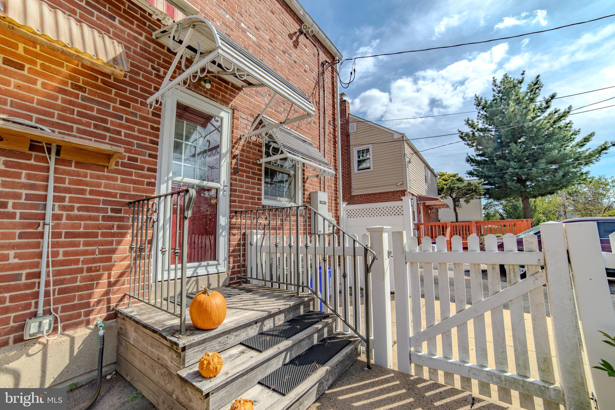304 Earlington Road Havertown, PA 19083 - Photo 19 of 26 a view of a brick house with iron fence