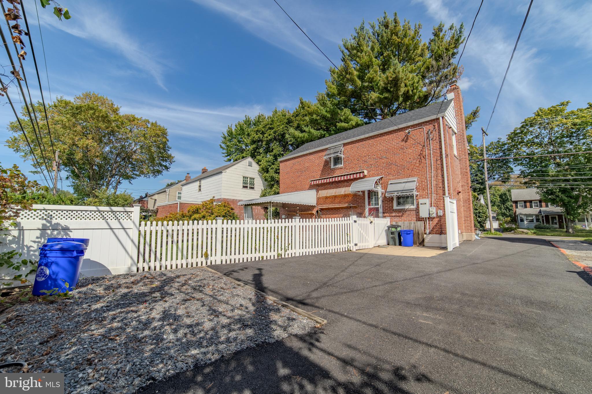 304 Earlington Road Havertown, PA 19083 - Photo 23 of 26 a view of a house with backyard and sitting area