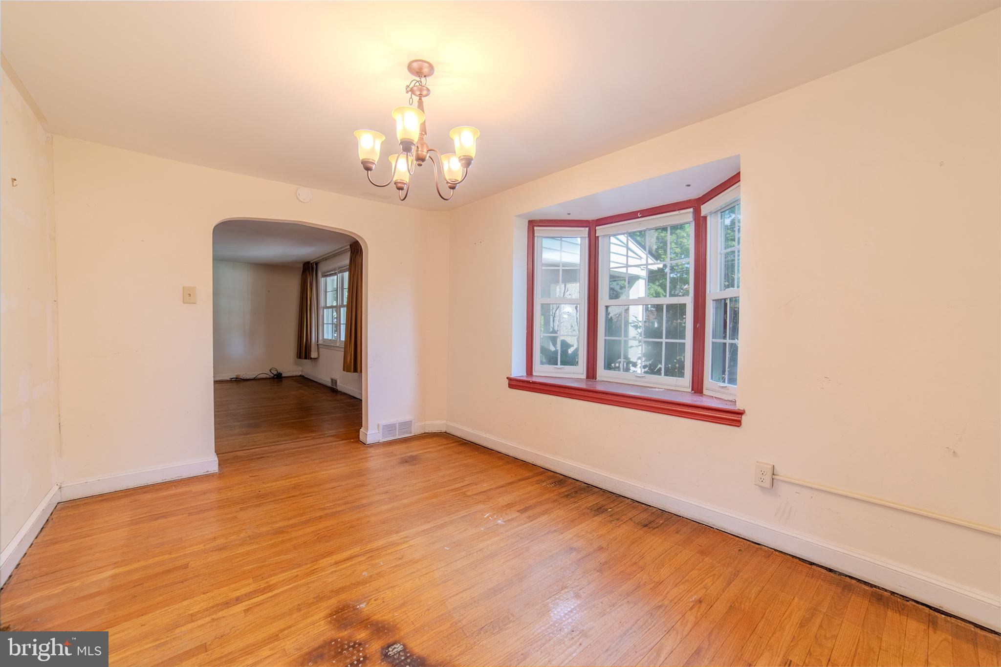 304 Earlington Road Havertown, PA 19083 - Photo 5 of 26 a view of a livingroom with a chandelier