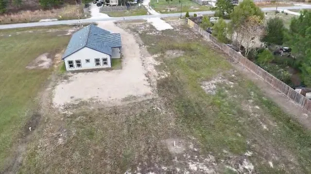 an aerial view of residential building with outdoor space
