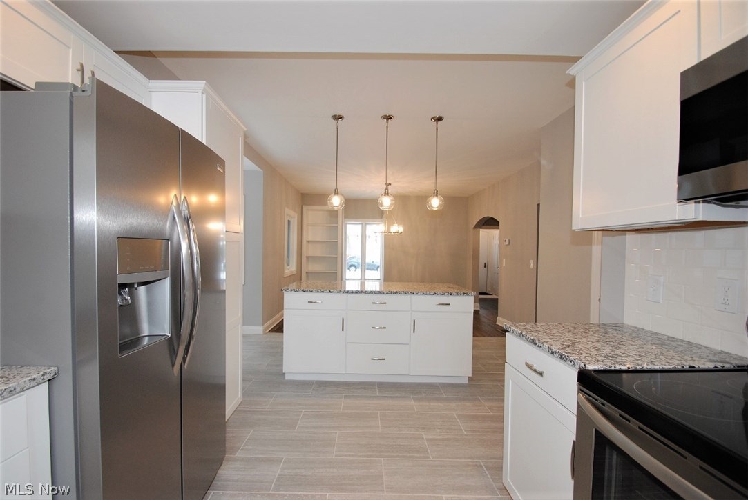 1303 Ford Road Lyndhurst, OH 44124 - Photo 11 of 29 Cooks Kitchen with Stainless Steel Appliances