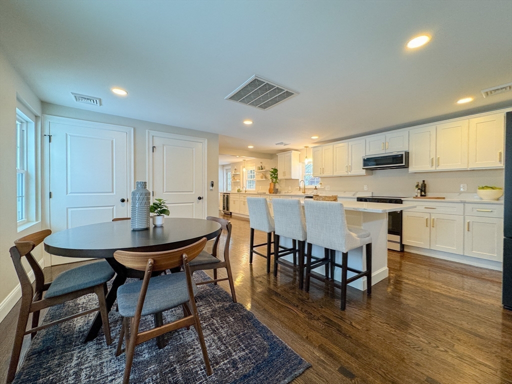 51 Westfield Road Warwick, RI 02888 - Photo 17 of 31 a view of kitchen with cabinets table and chairs