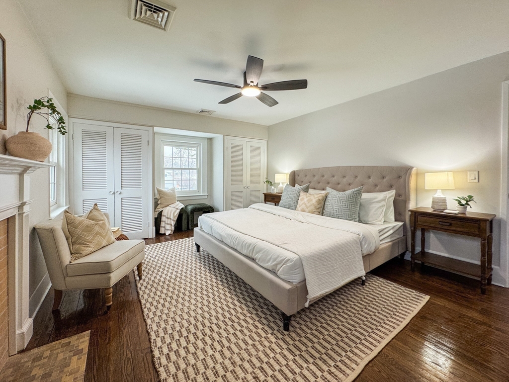 51 Westfield Road Warwick, RI 02888 - Photo 26 of 31 a bedroom with a bed and a chandelier