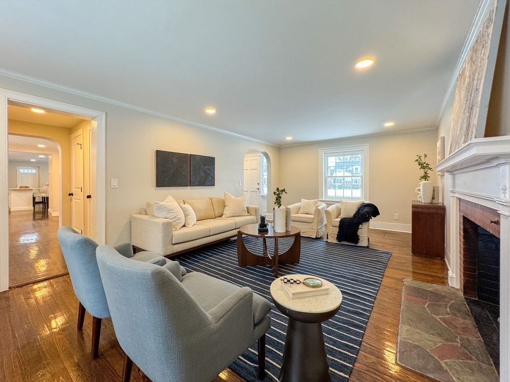 51 Westfield Road Warwick, RI 02888 - Photo 5 of 31 a living room with furniture and a fireplace