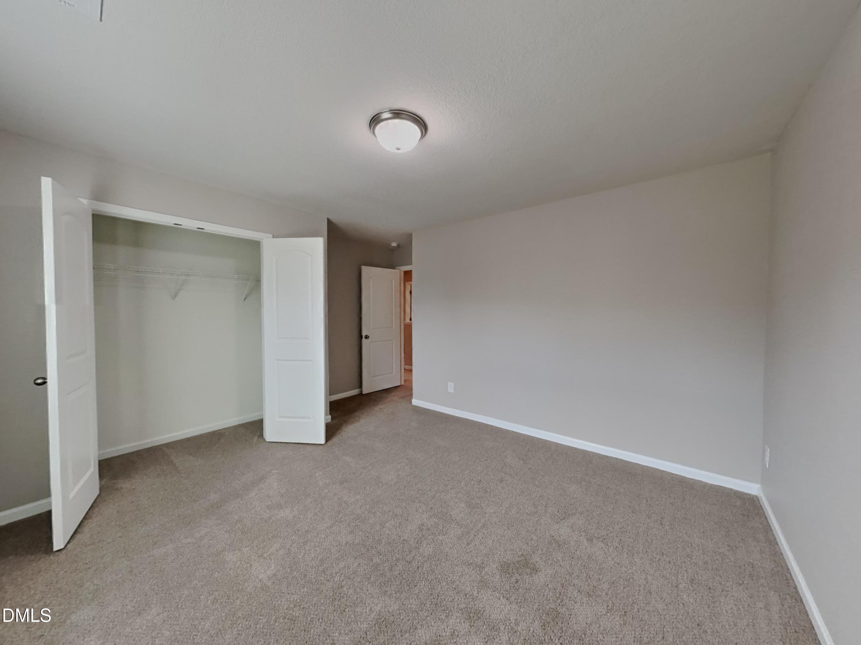 784 Frosty Way Zebulon, NC 27597 - Photo 12 of 15 a view of an empty room