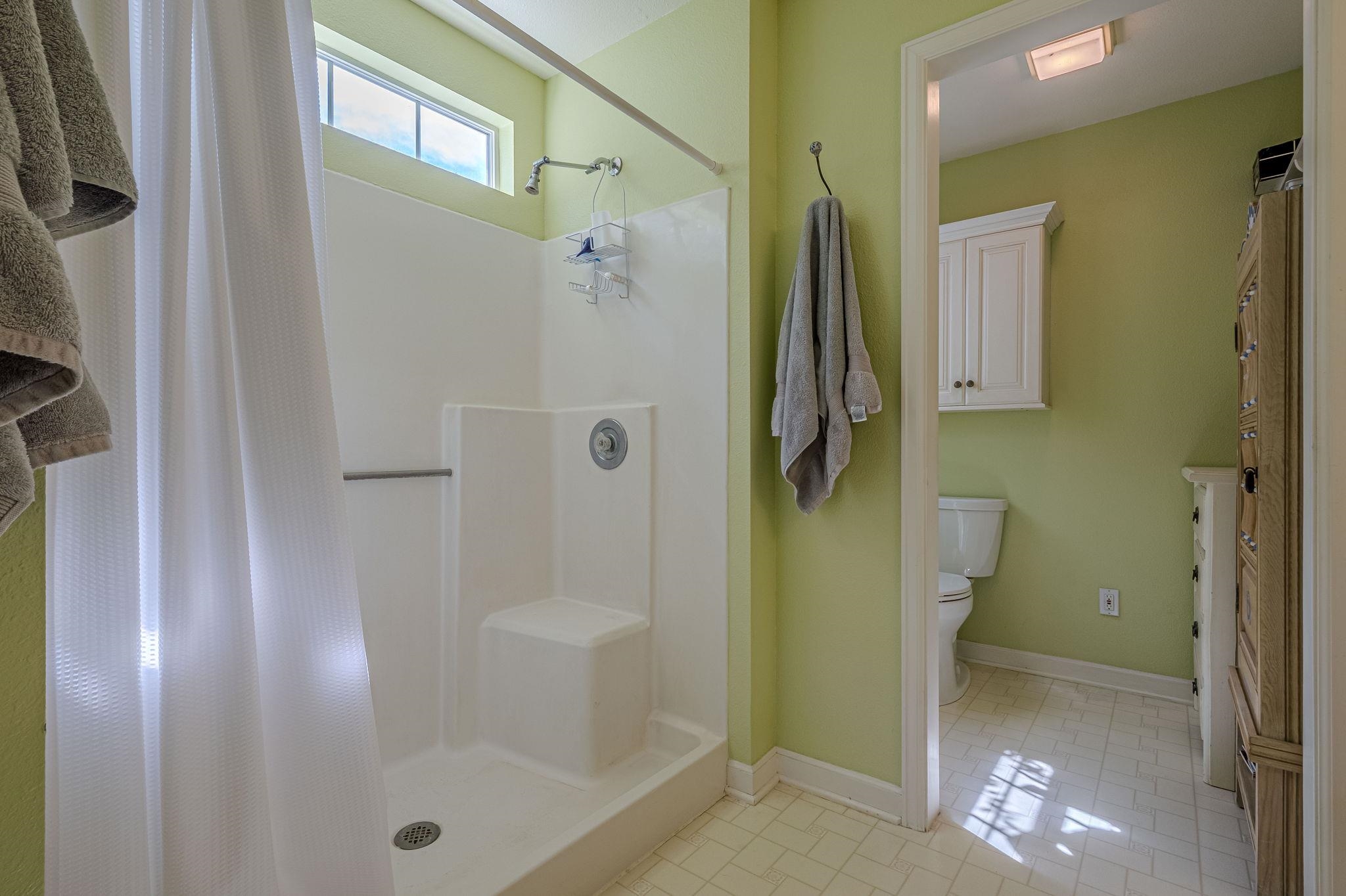 3613 G Road, Unit E Palisade, CO 81526 - Photo 12 of 42 a bathroom with a shower