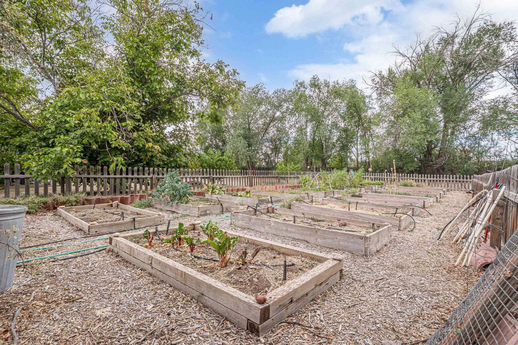 3613 G Road, Unit E Palisade, CO 81526 - Photo 37 of 42 a view of a yard with wooden fence