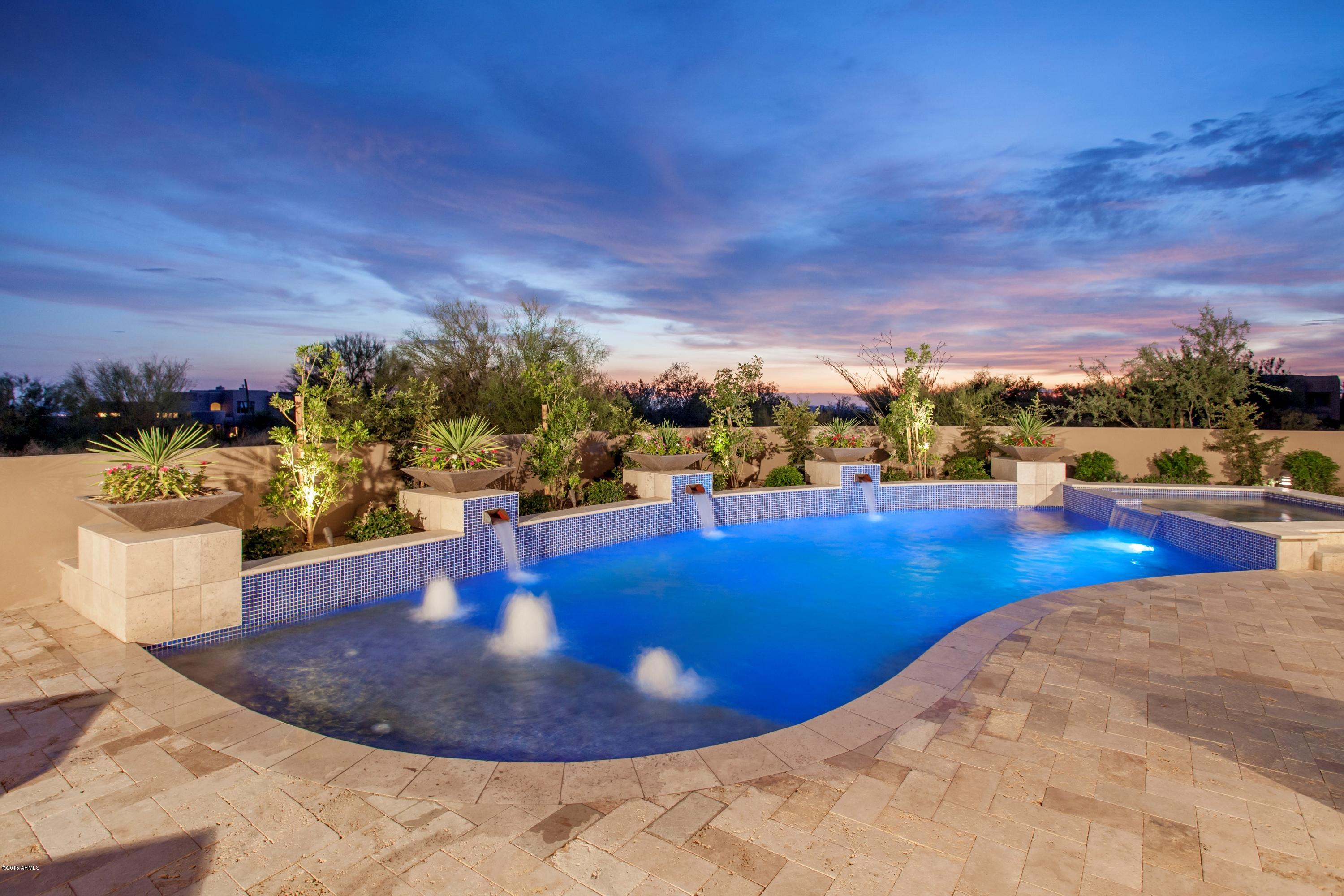 10040 East Happy Valley Road, Unit 14 Scottsdale, AZ 85255 - Photo 1 of 21 a view of a swimming pool