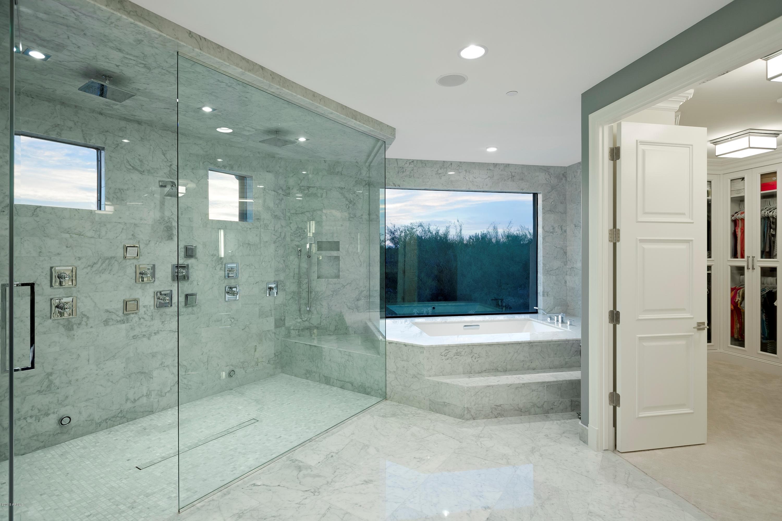 10040 East Happy Valley Road, Unit 14 Scottsdale, AZ 85255 - Photo 13 of 21 a bathroom with a shower and a toilet