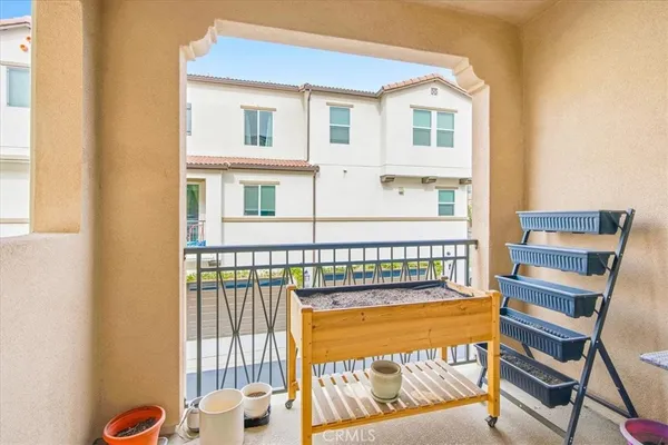 a view of a balcony with a furniture