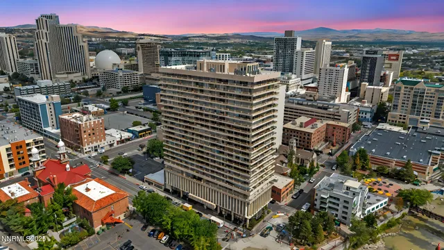 a view of a city with tall buildings
