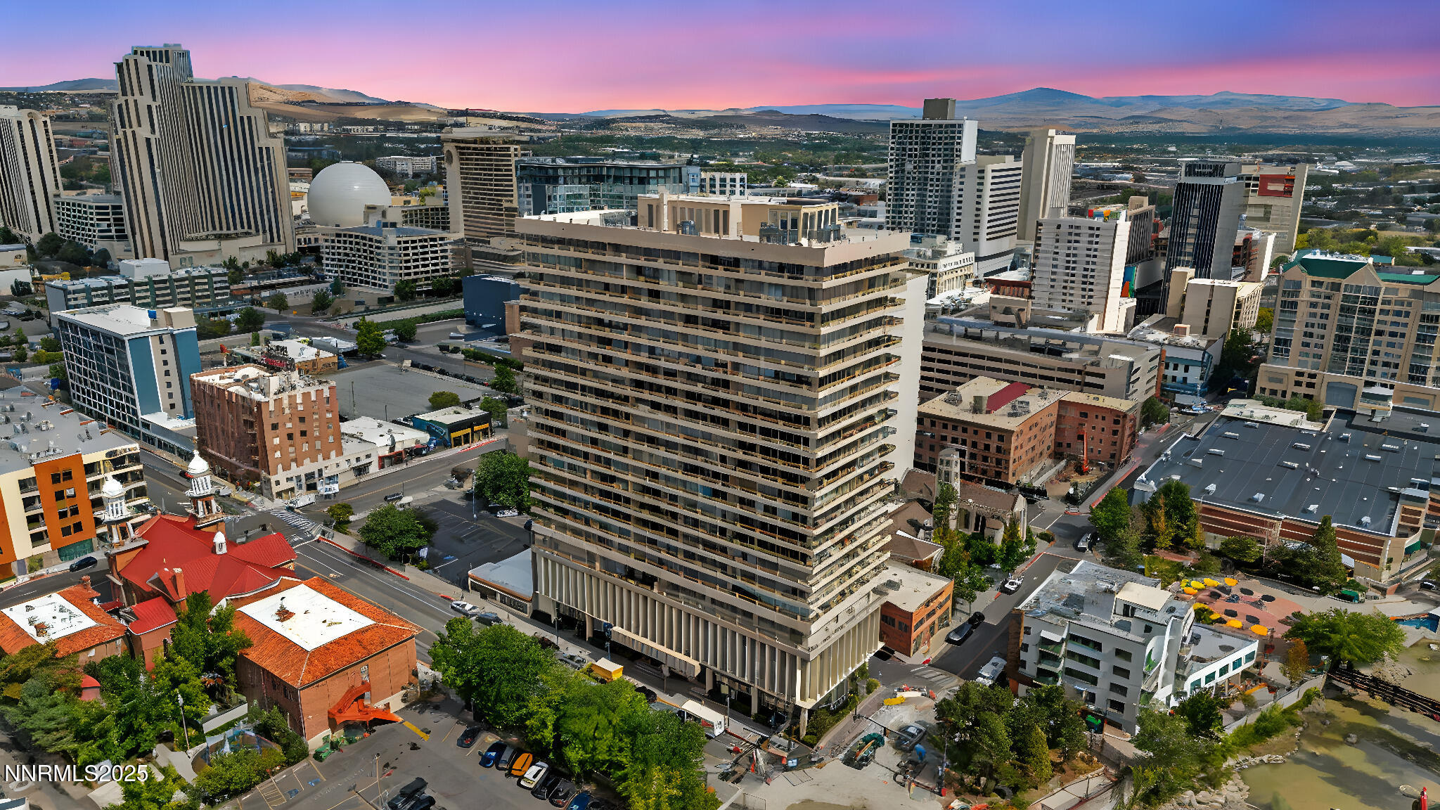 100 North Arlington Avenue, Unit 22C Reno, NV 89501 - Photo 1 of 34 a view of a city with tall buildings