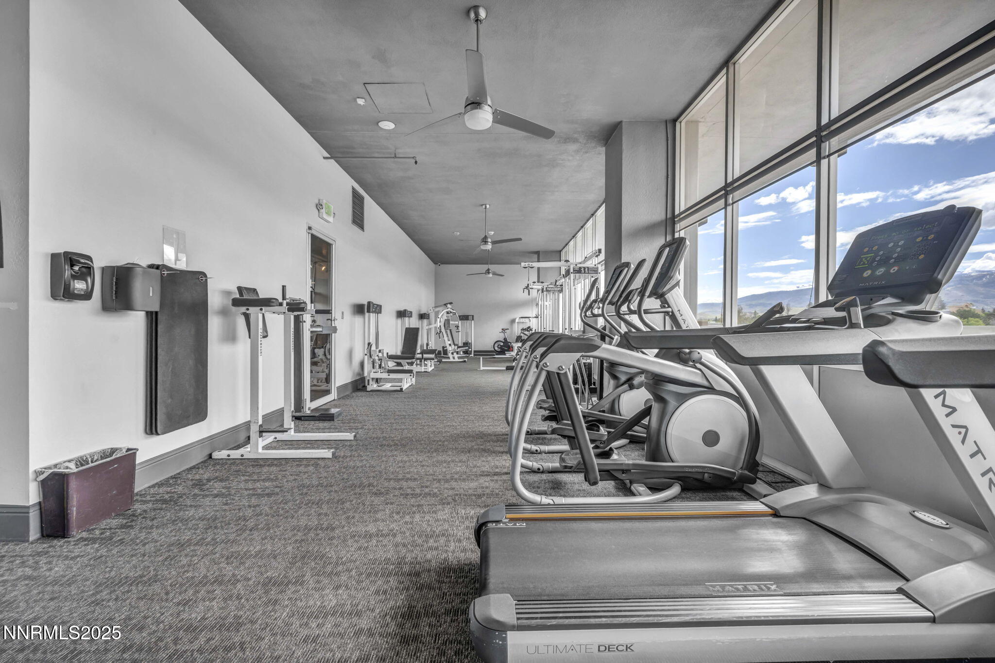 100 North Arlington Avenue, Unit 22C Reno, NV 89501 - Photo 26 of 34 a view of a room with gym equipment