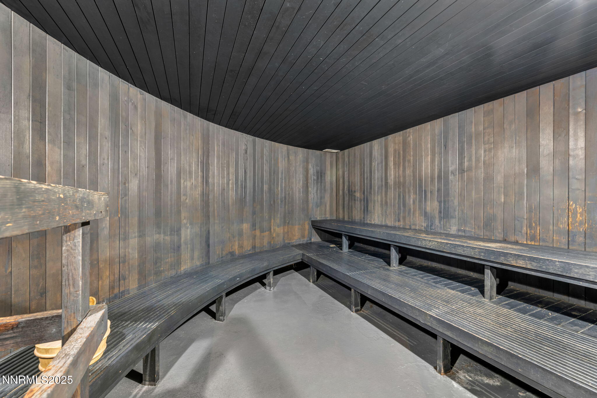 100 North Arlington Avenue, Unit 22C Reno, NV 89501 - Photo 32 of 34 a view of a room with a wooden wall