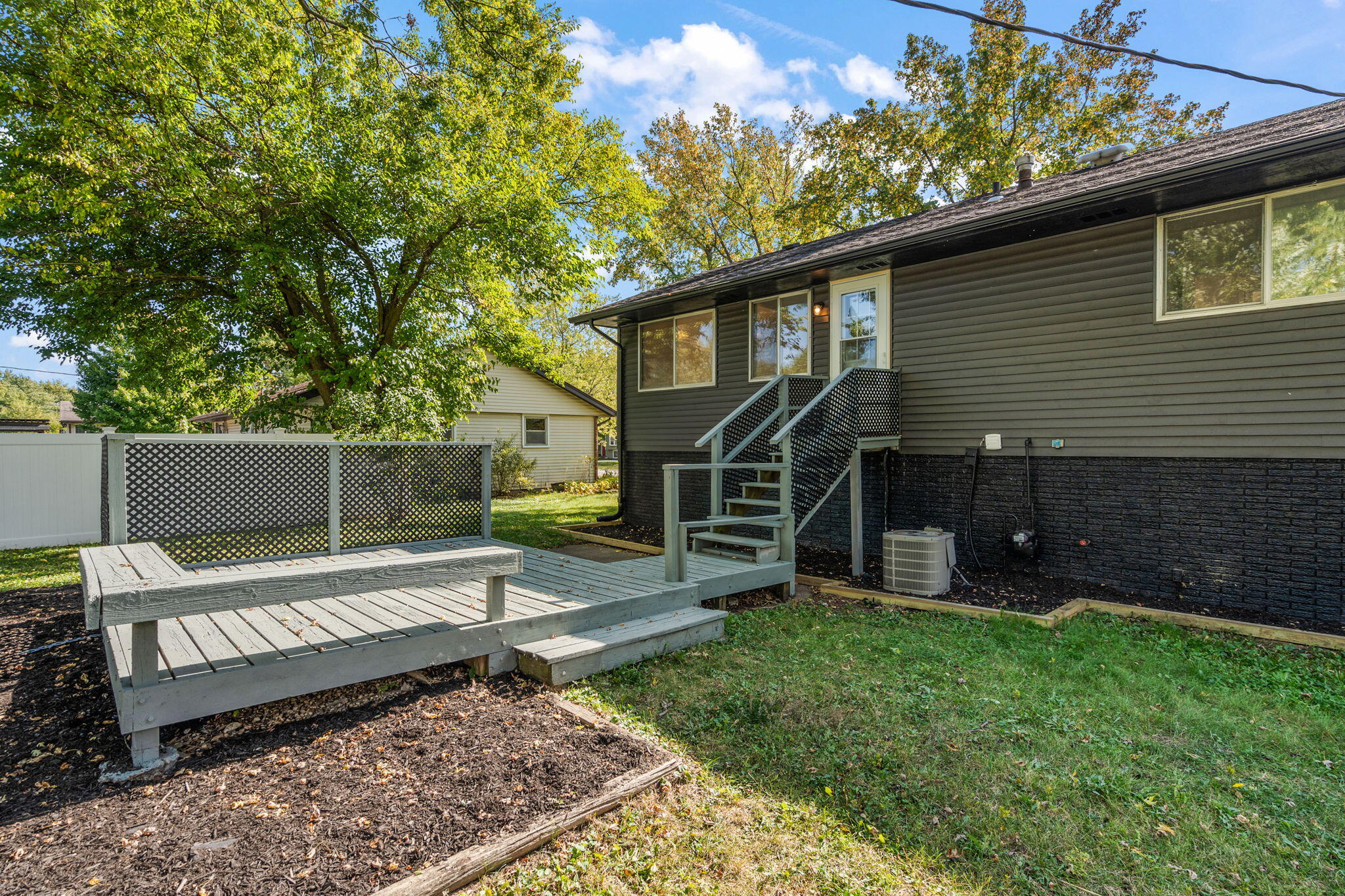 654 Cheyenne Drive Lowell, IN 46356 - Photo 9 of 11 a view of a house with a yard