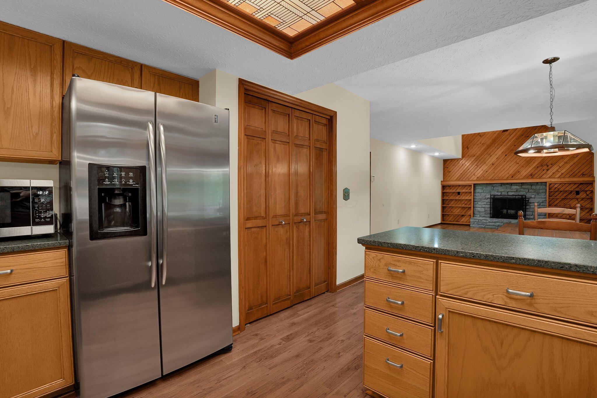 623 Rockbridge Road Westerville, OH 43081 - Photo 13 of 63 Well-appointed kitchen has stainless steel appliances, granite countertops and custom backsplash. Large double door pantry makes storing your snacks easy!