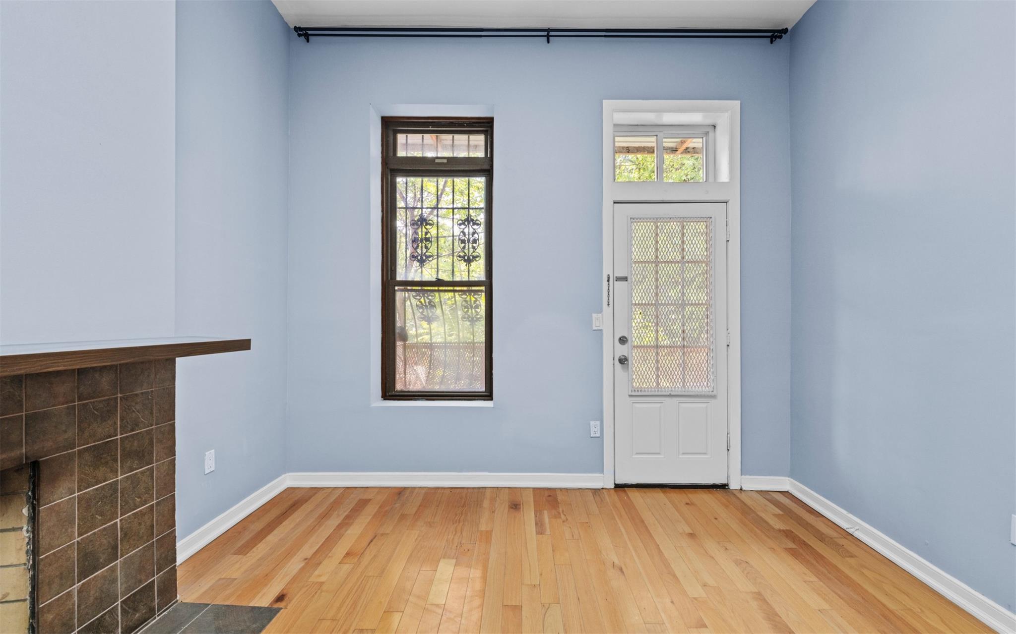 626 Madison Street Brooklyn, NY 11221 - Photo 17 of 42 Foyer entrance featuring light wood-style flooring and baseboards