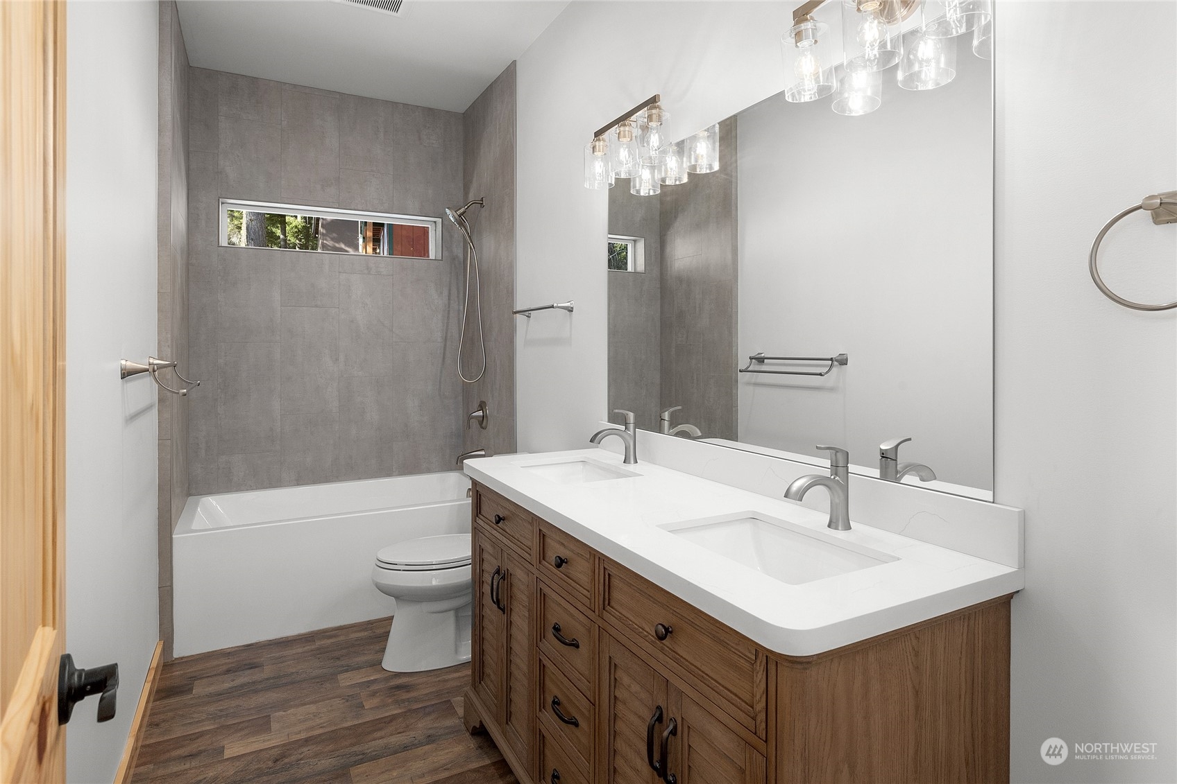 1089 Highland Loop Ronald, WA 98940 - Photo 17 of 40 a bathroom with a sink a toilet a mirror and shower