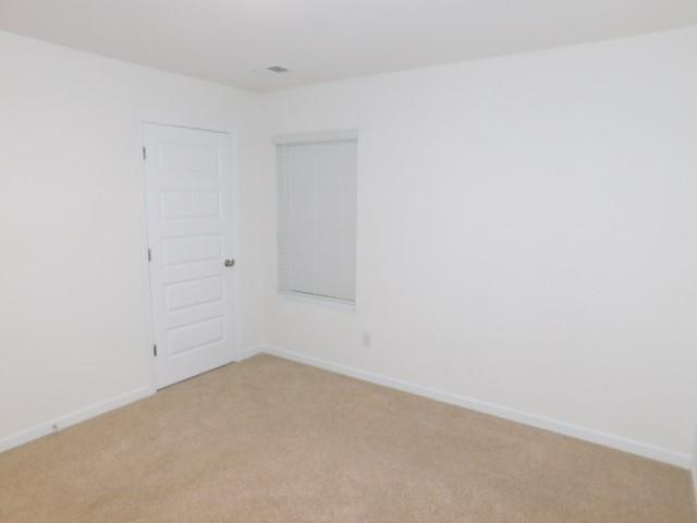 3689 Chevington Court Southeast Atlanta, GA 30354 - Photo 22 of 30 a view of an empty room