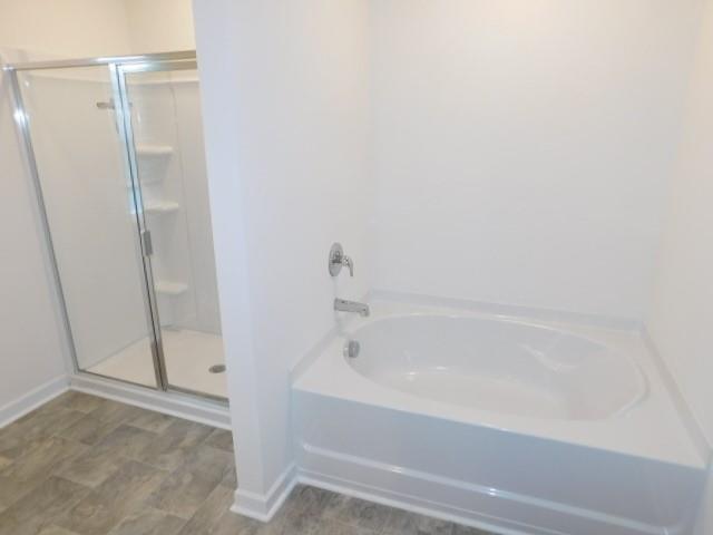 3689 Chevington Court Southeast Atlanta, GA 30354 - Photo 28 of 30 a bathroom with a bathtub