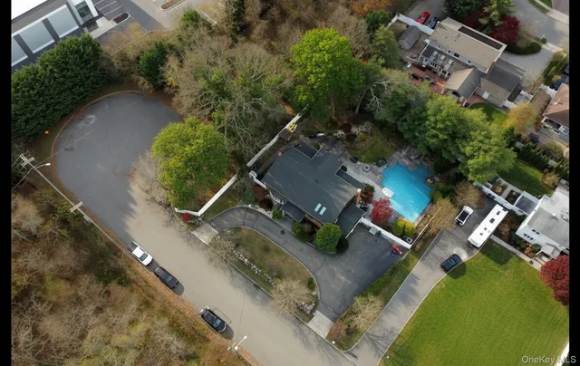 an aerial view of a house with outdoor space
