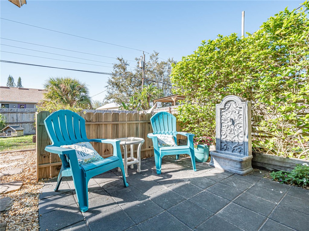 438 Columbus Street Sebastian, FL 32958 - Photo 16 of 32 a view of a two chairs in patio area of the house