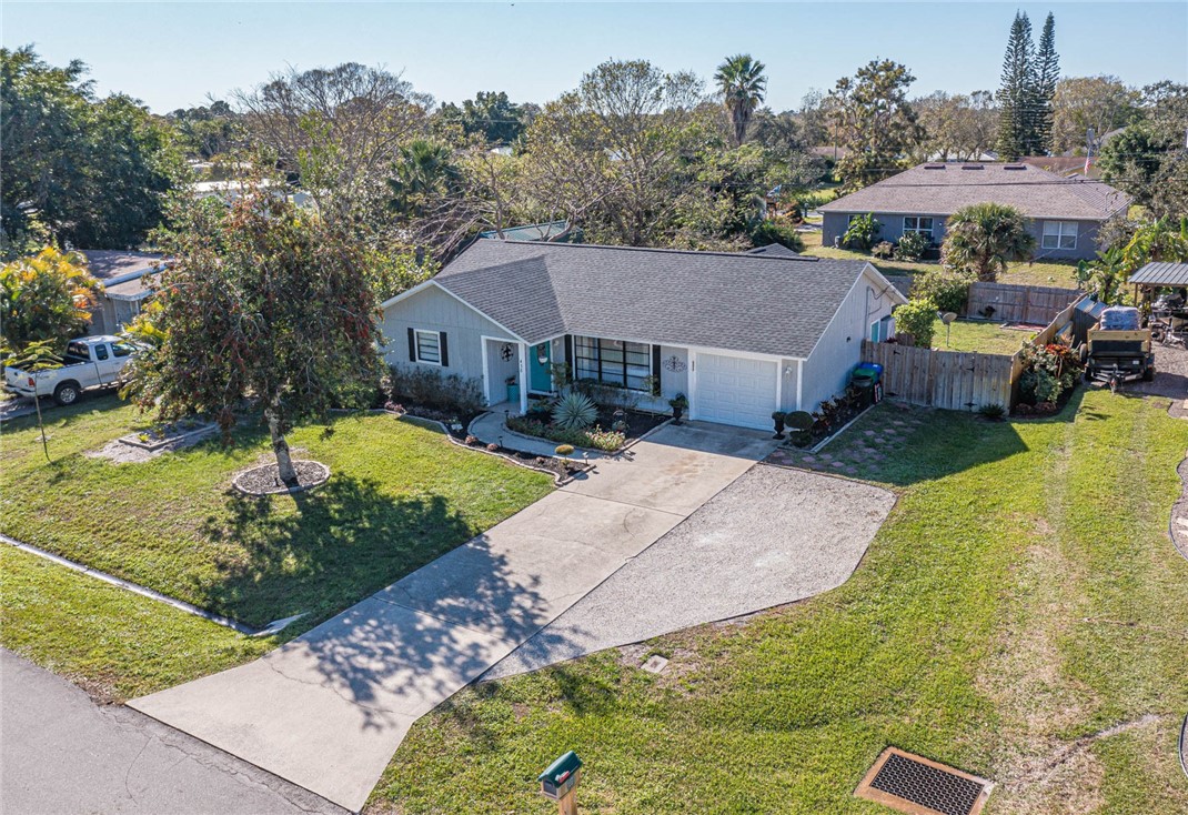 438 Columbus Street Sebastian, FL 32958 - Photo 30 of 32 a view of a house with garden