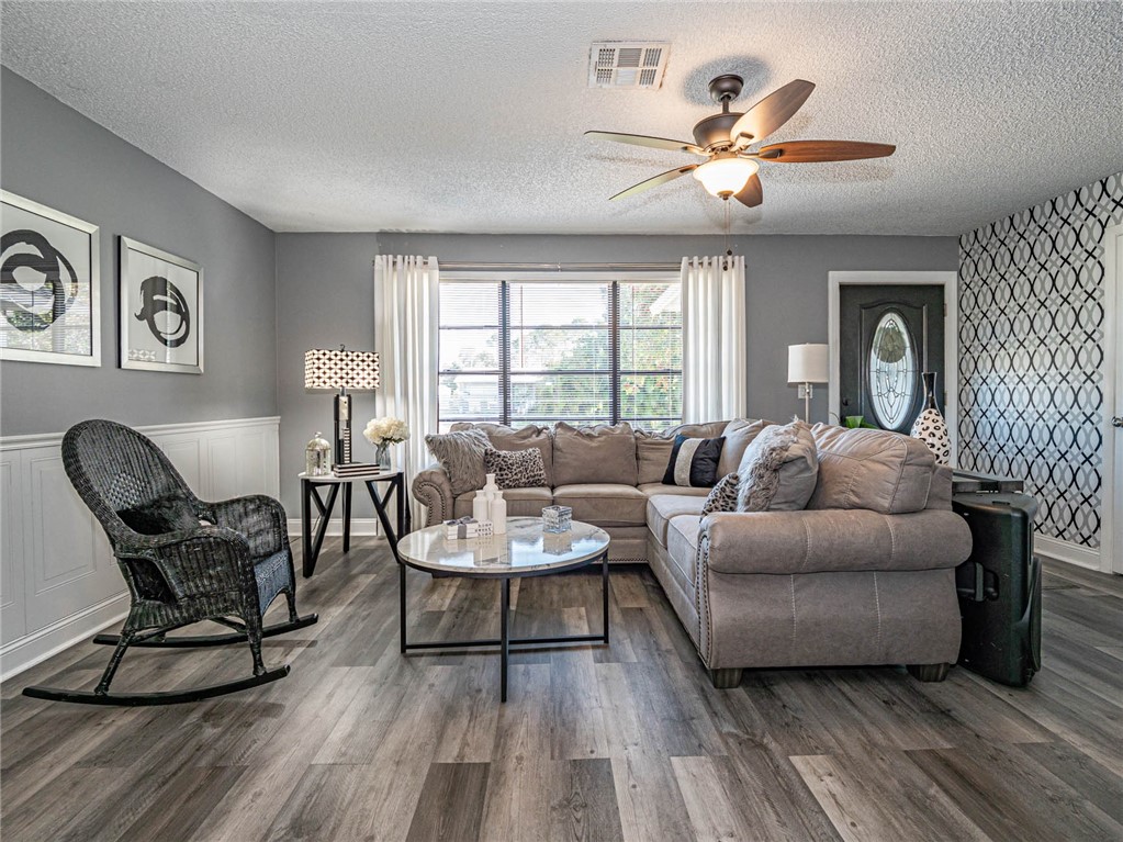 438 Columbus Street Sebastian, FL 32958 - Photo 6 of 32 a living room with furniture and a large window