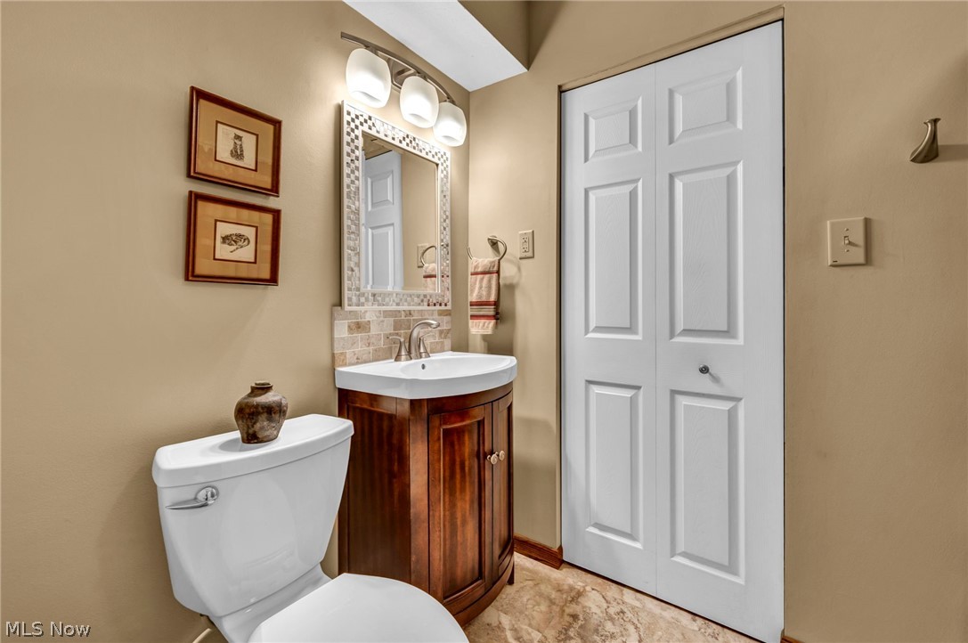 1057 Congress Lake Road Mogadore, OH 44260 - Photo 21 of 50 Full bathroom on the first floor near the secondary bedrooms