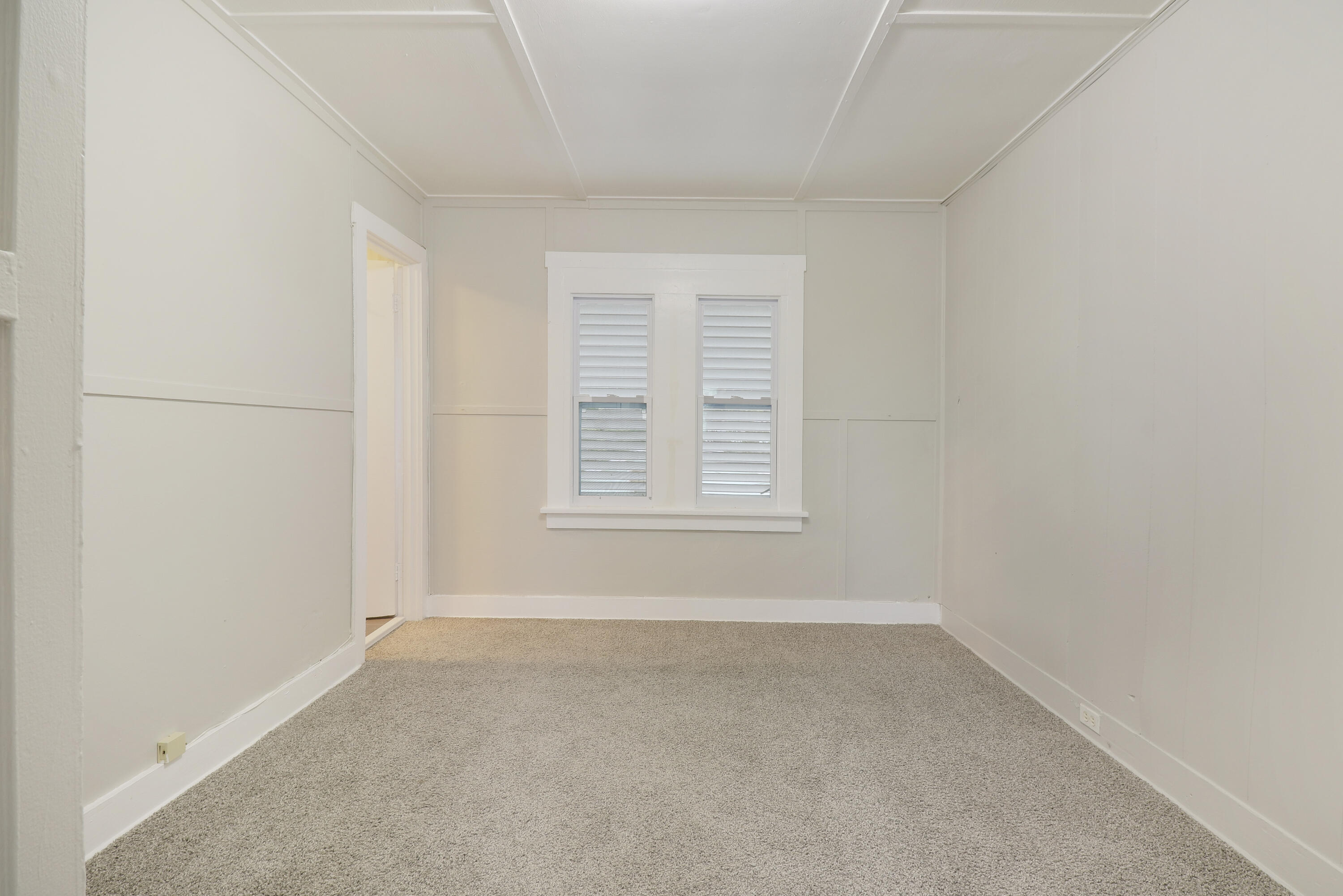 1118 North J Street, Unit C Lake Worth Beach, FL 33460 - Photo 12 of 13 an empty room with windows