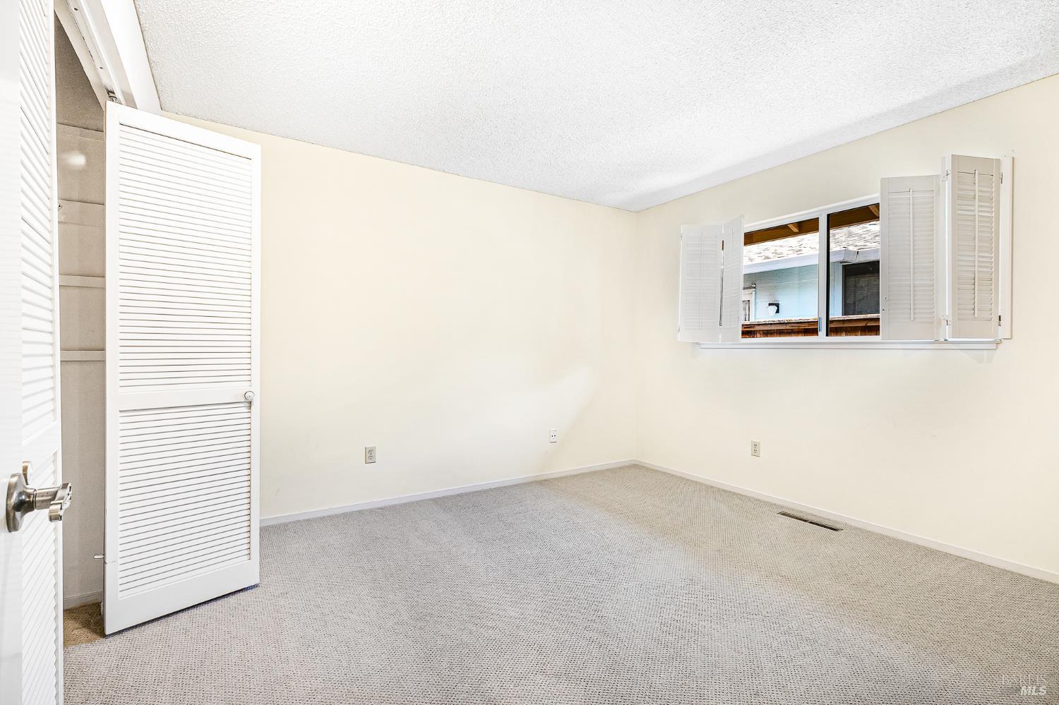 138 Oak Shadow Drive Santa Rosa, CA 95409 - Photo 29 of 50 an empty room with windows