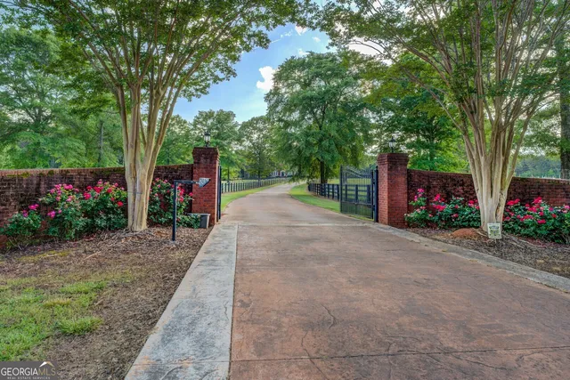 a living room with fireplace and a flat screen tv