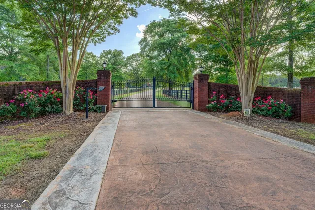 a living room with fireplace furniture and a flat screen tv