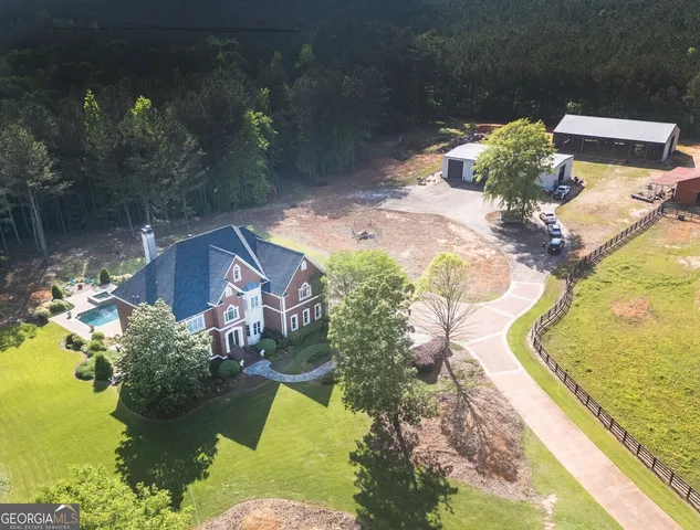 a view of a park with large trees