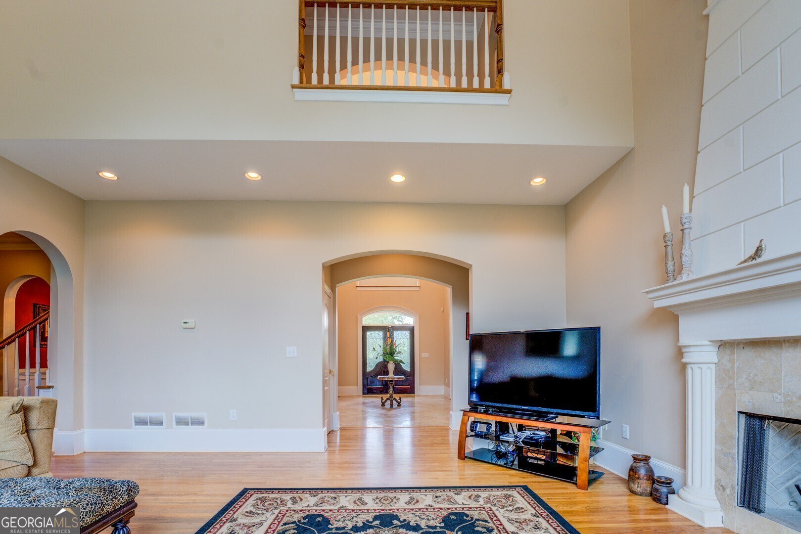 20207 State Highway 11 Monticello, GA 31064 - Photo 42 of 159 a living room with fireplace furniture and a flat screen tv