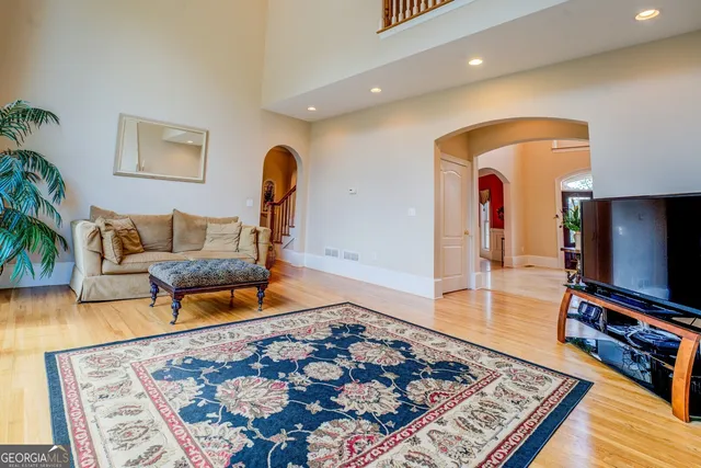 an aerial view of residential houses with outdoor space
