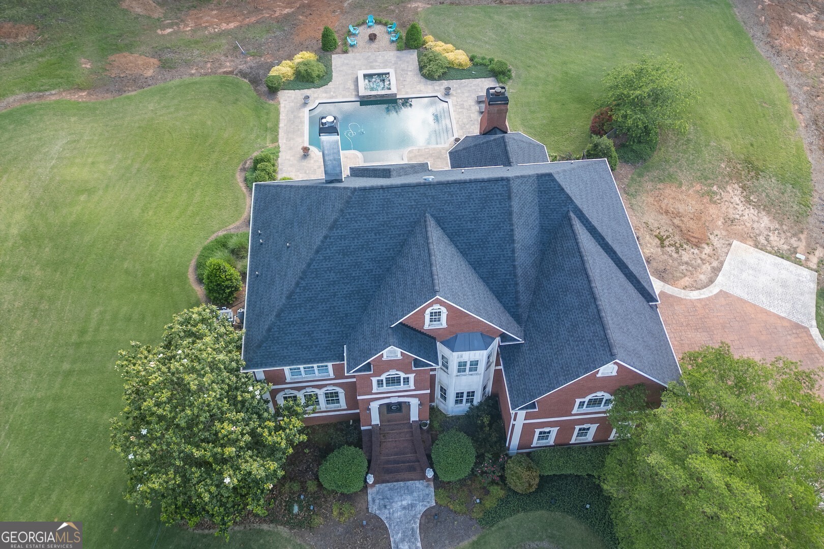 20207 State Highway 11 Monticello, GA 31064 - Photo 6 of 159 an aerial view of a house with a garden and yard