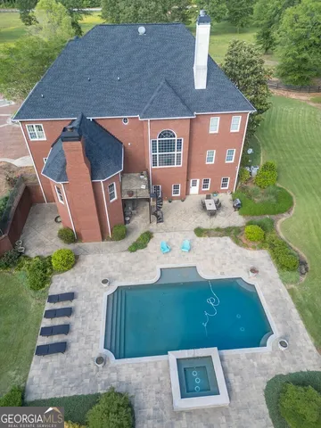 a view of a patio with a yard