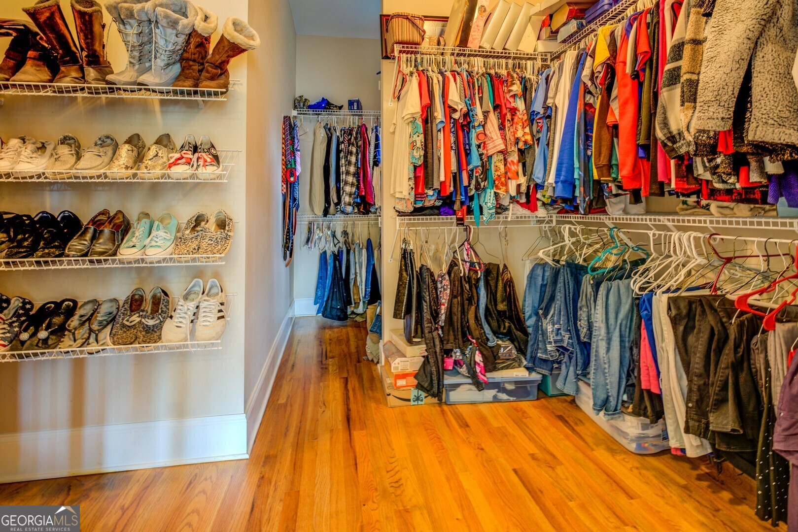 20207 State Highway 11 Monticello, GA 31064 - Photo 92 of 159 a view of walk in closet with clothes and shoes