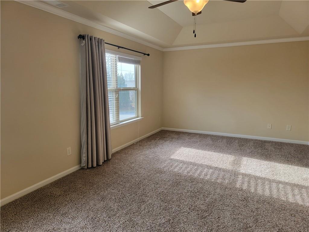 2707 Morgan Glen Road Northeast Buford, GA 30519 - Photo 11 of 24 an empty room with a window