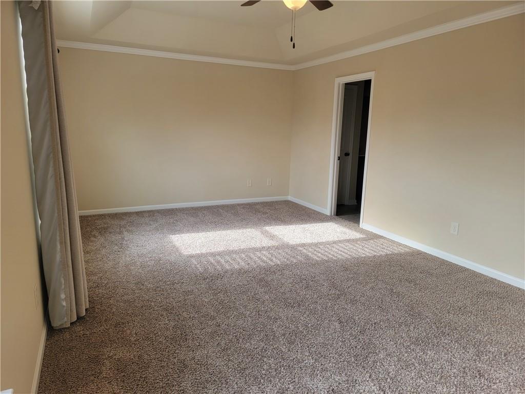 2707 Morgan Glen Road Northeast Buford, GA 30519 - Photo 12 of 24 an empty room with a empty space and windows