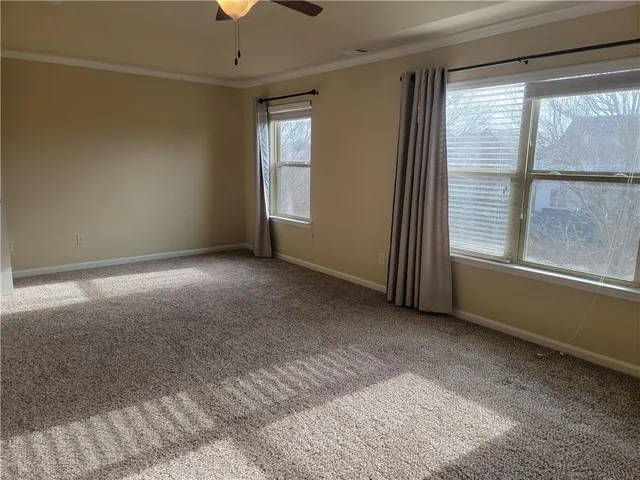 a view of a room that has a window in it