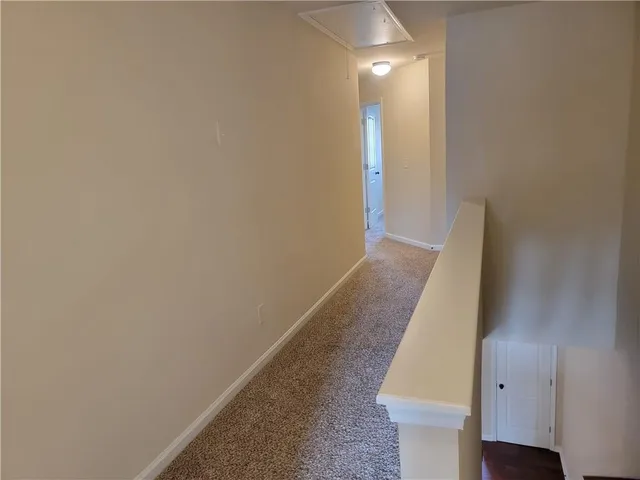 a view of hallway with stairs