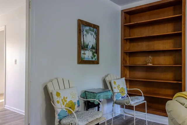 a workspace with furniture and wooden floor