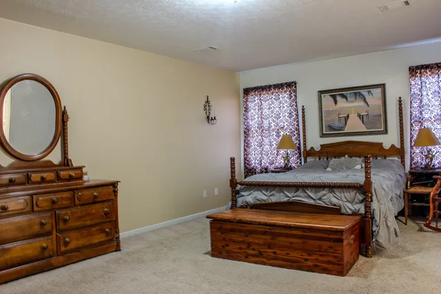 a view of living room with furniture and wooden floor