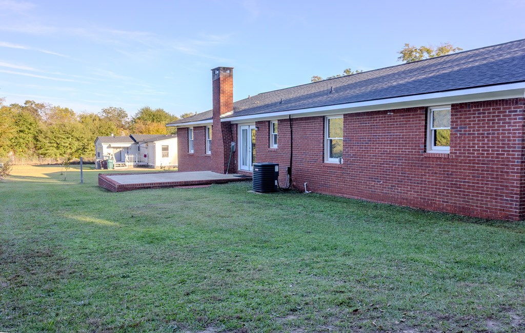 196 Russell Williams Road Eufaula, AL 36027 - Photo 28 of 30 a front view of a house with a garden and yard