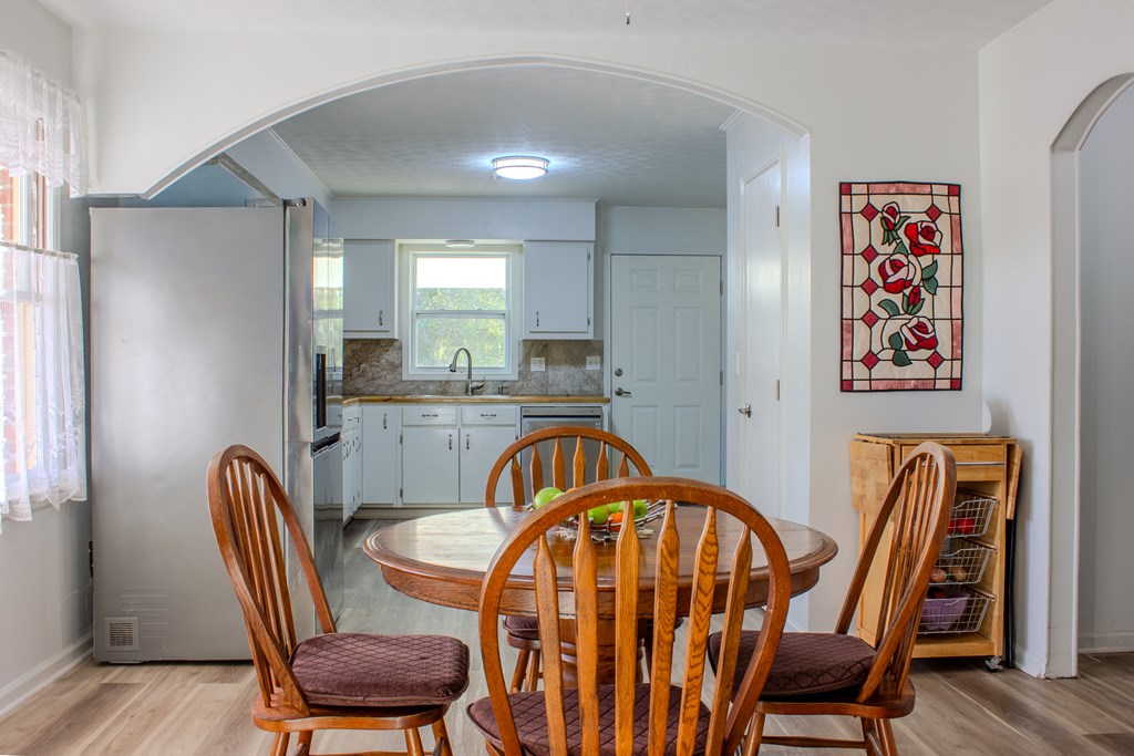 196 Russell Williams Road Eufaula, AL 36027 - Photo 5 of 30 a view of a dining room with furniture and wooden floor